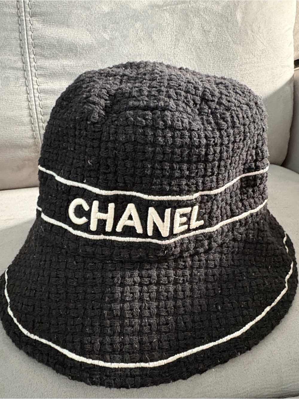 CHANEL Black Bucket Hat with White Embroidered Logo